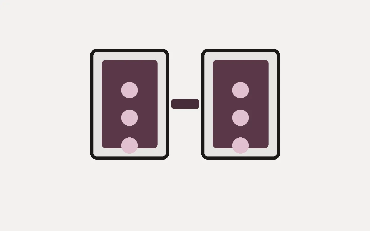 Close detail of the tile-pair connector between two matching upright tiles.
